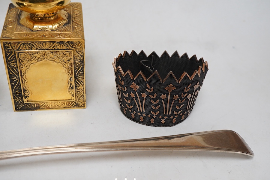 A modern silver gilt Amouage perfume bottle in the form of Oman Palace Ruwi mosque, maker possibly Asprey & Co, London, 1995, height 12.3cm, together with a George III silver Old English thread pattern basting spoon, by